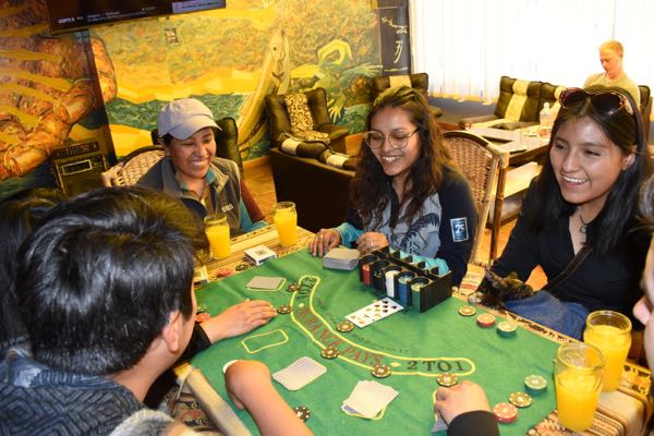 Pool table and game room with Simpsons mural